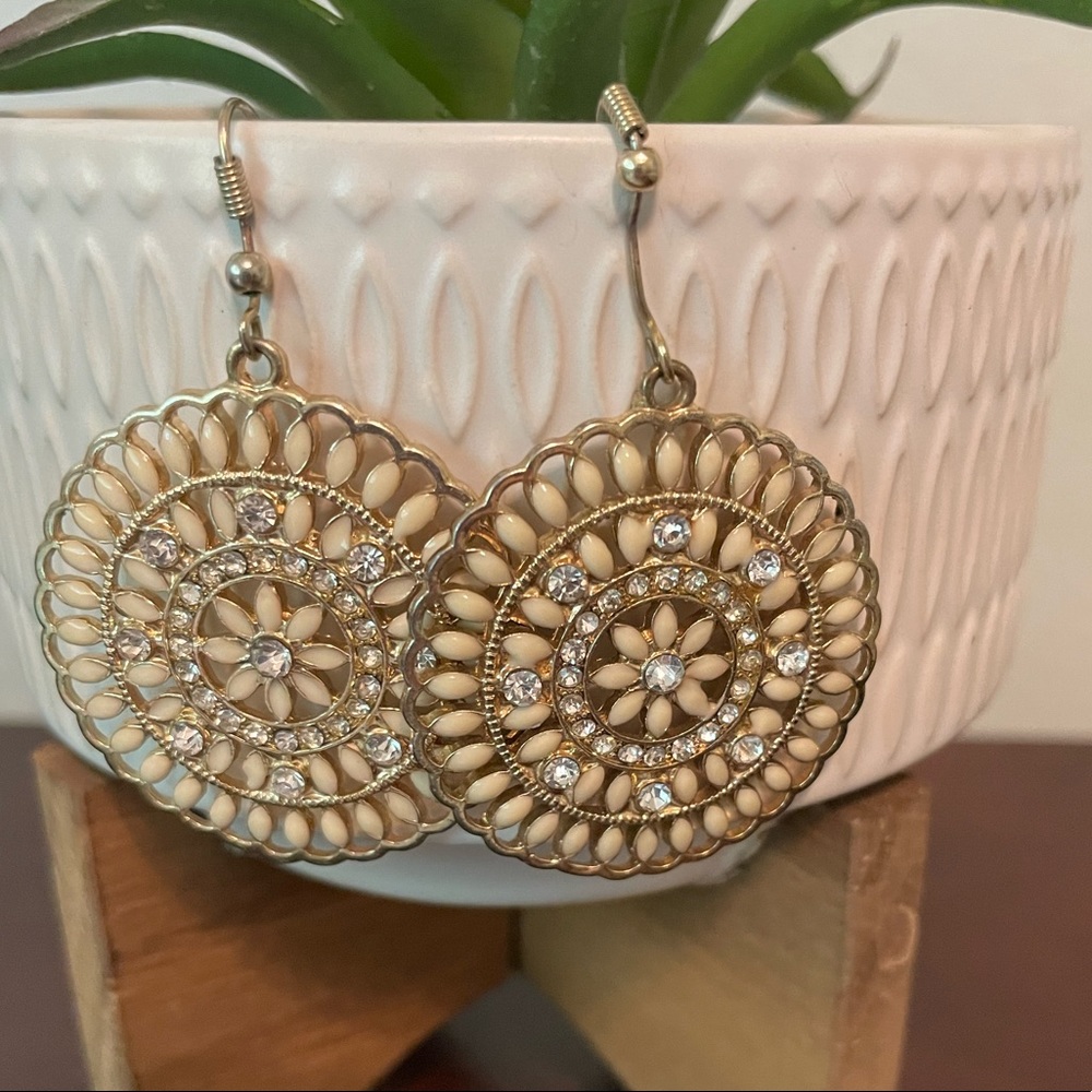 Cream and gold earrings